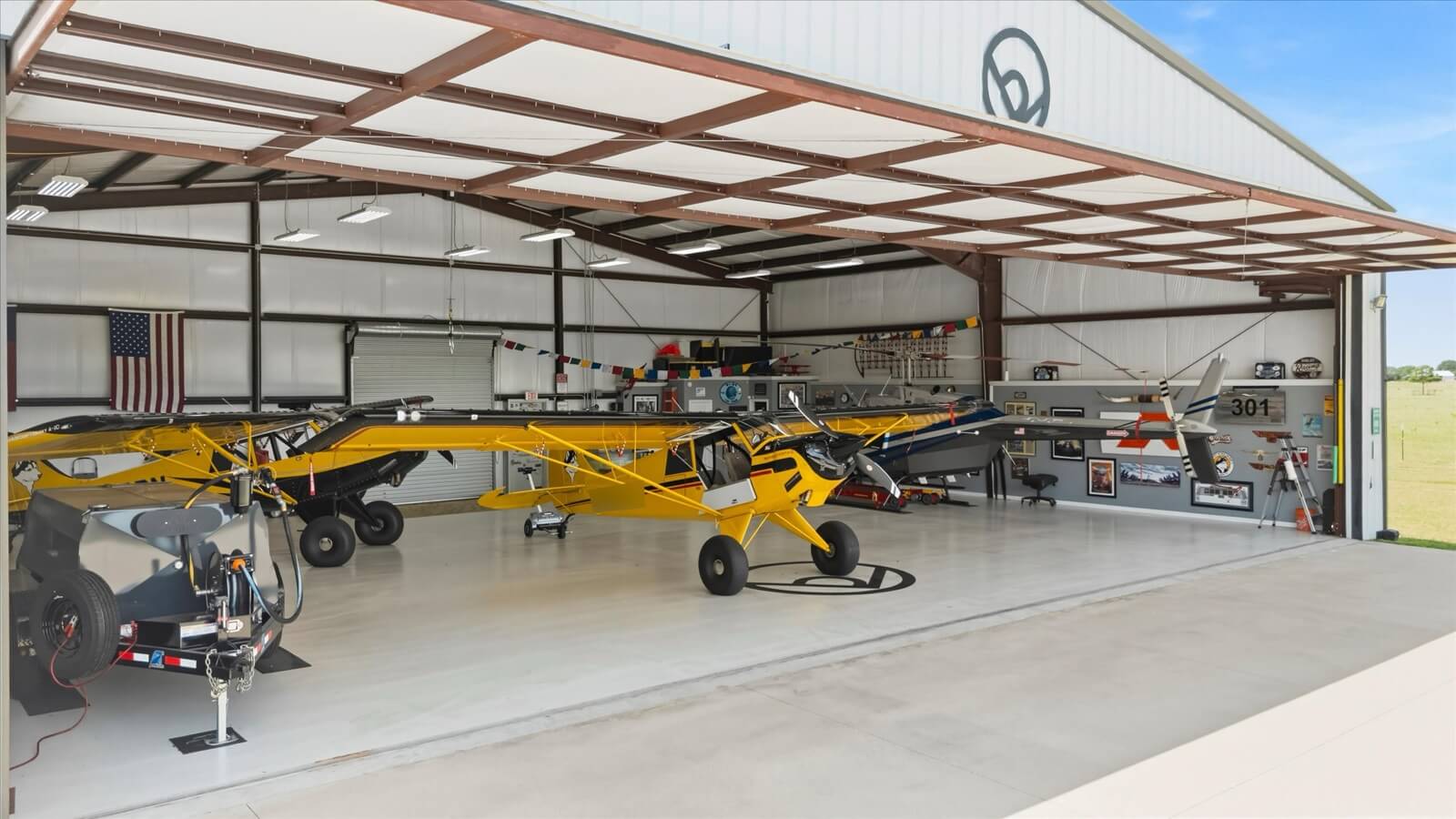 Hangar interior with flags flying